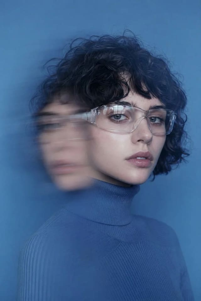 Futuristic editorial portrait with double-exposure motion blur