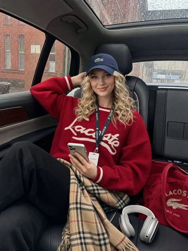 Candid rainy-day fashion portrait in a luxury SUV