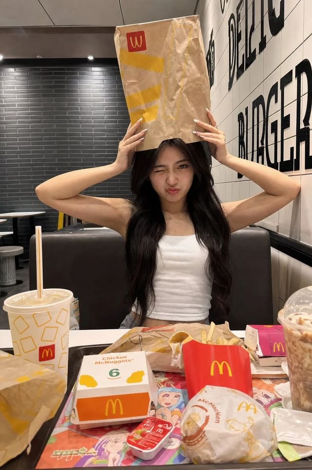 GPT Image 2 prompt for playful McDonald’s-style iPhone booth photo