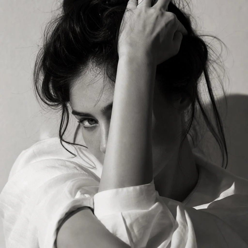 Black-and-white high-fashion editorial portrait