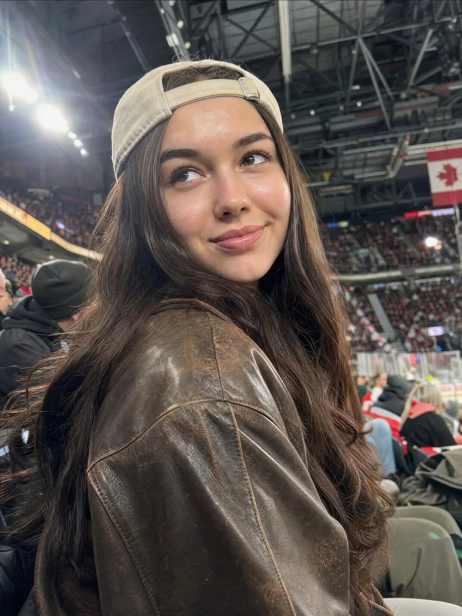 Realistic candid woman in a crowded sports arena