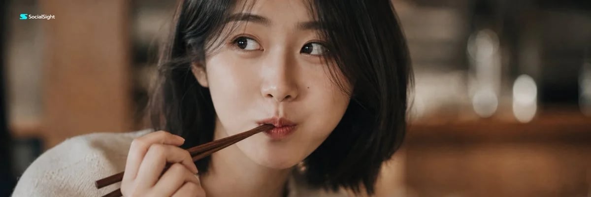 Playful cinematic close-up portrait of a woman with chopsticks