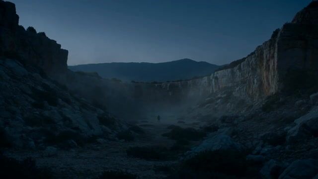 Ultra-cinematic fantasy dragon reveal in a mountain valley at dusk