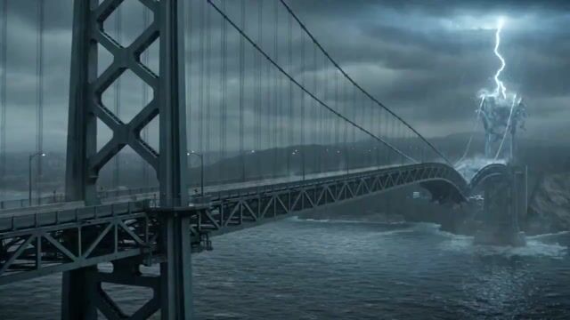 Motorcyclist escapes a collapsing suspension bridge in a storm