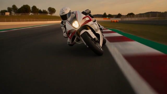 Ultra-cinematic superbike racing sequence at sunset